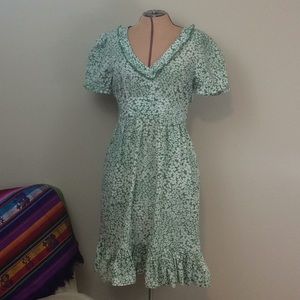 Ashley Judd green, floral, ruffles dress